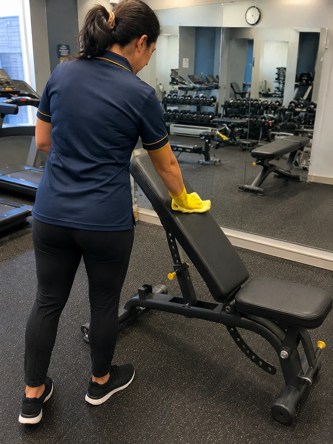 Cleaned gym floor and equipment in a Montreal fitness center